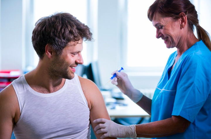 Image of a man getting ready for IV therapy.